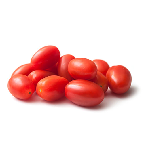 closeup of mini organic tomatoes roma on white background